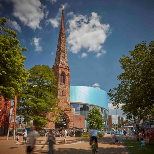 People walking through Coventry city centre